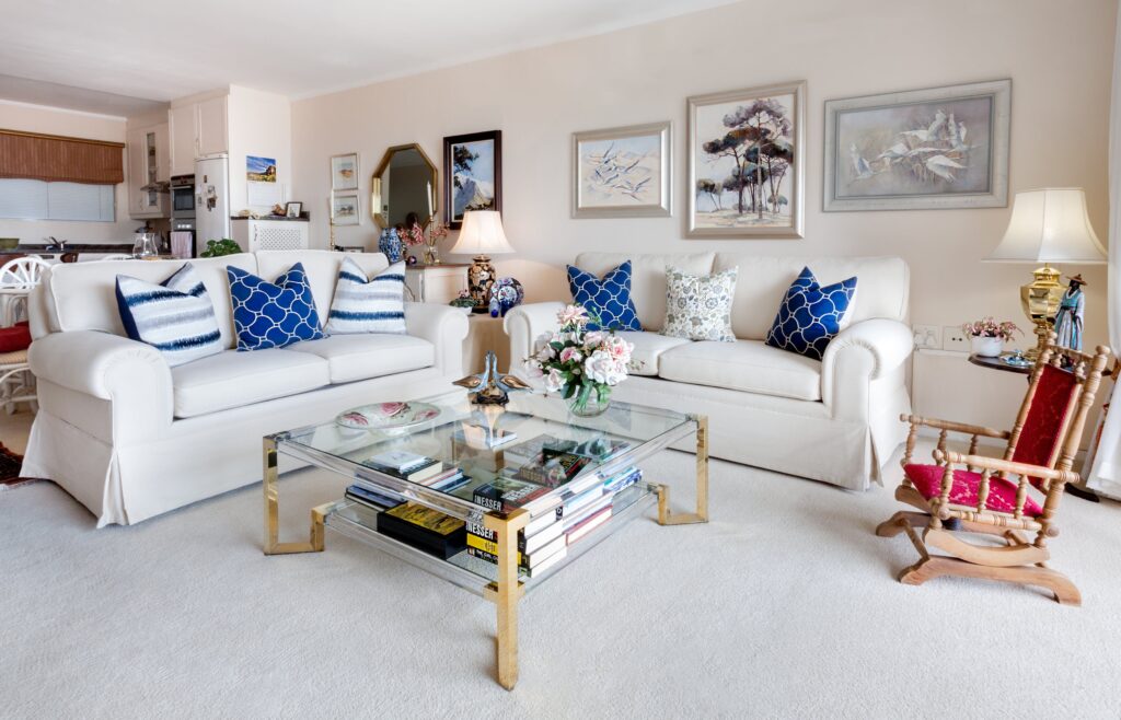 Square Glass Top Coffee Table and Two White Leather 2-seat Sofas